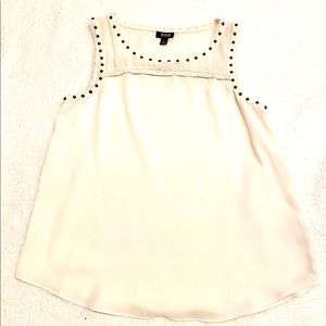 Sleeveless cream top